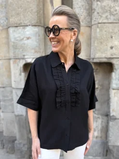 Marianne frillapaita; musta